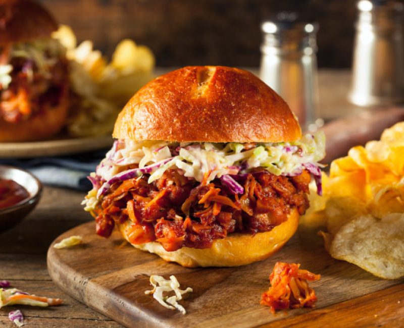 Homemade Vegan Pulled Jackfruit BBQ Sandwich with Coleslaw and Chips